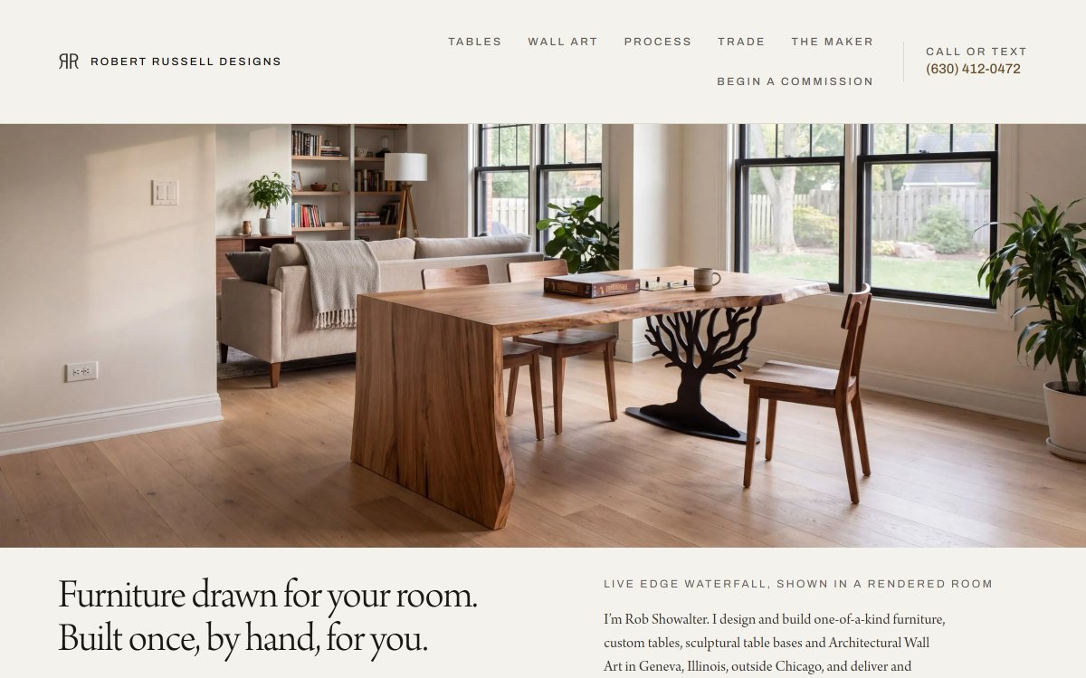 The live Robert Russell Designs homepage: a live edge waterfall table on a tree-shaped steel base in a bright room, under the headline Furniture drawn for your room